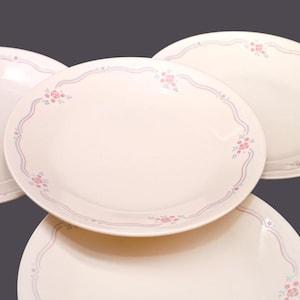 Four Corelle Corningware English Breakfast bread plates made in USA.