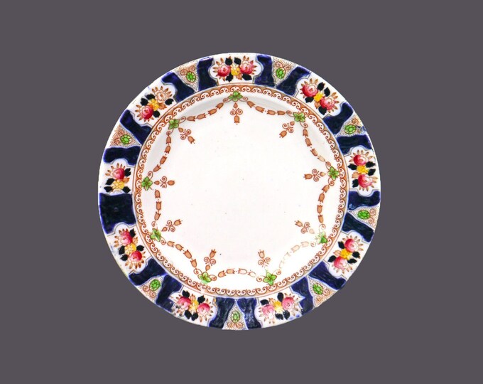 English-made hand-decorated Imari bread plate. Cobalt panels, fruit, gold swags.
