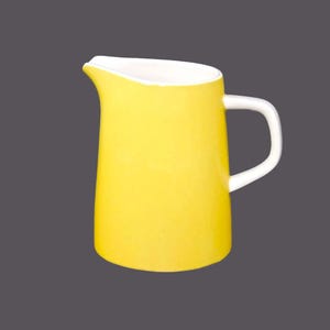 Mikasa Dolly 3997 Cera-stone yellow stoneware creamer jug made in Japan.