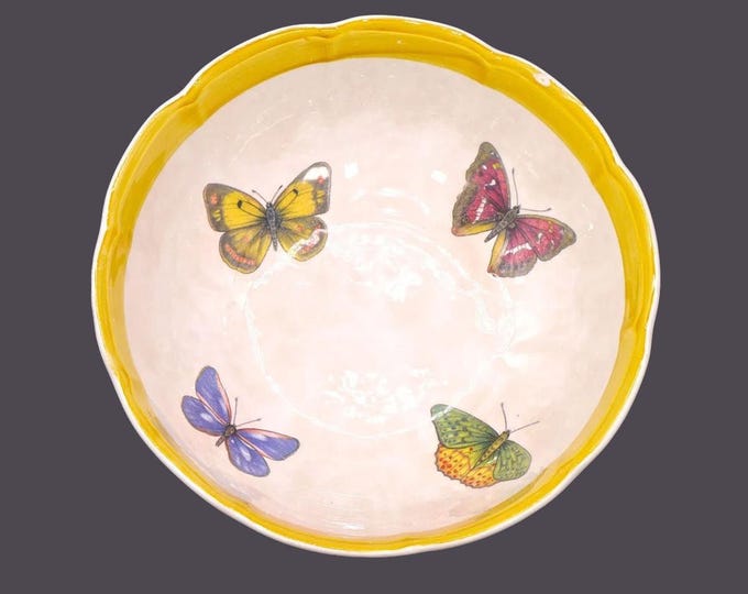 Ceramica Due Torri round salad or pasta serving bowl. Made in Italy. Butterflies, yellow border band. Flaw (see below).