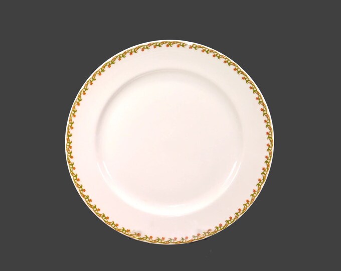 Antique art nouveau period Haviland Limoges luncheon plate. Peachy pink star-shaped floral garland. Made in France. Flaw (see below).