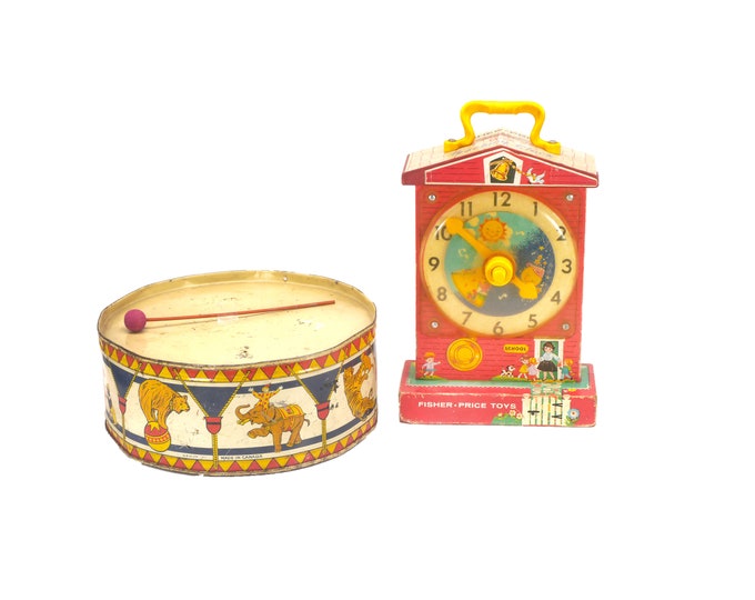 Pair of vintage toddler toys. GSW metal drum with wooden drumstick, Fisher Price Music Box Teaching Clock #998.