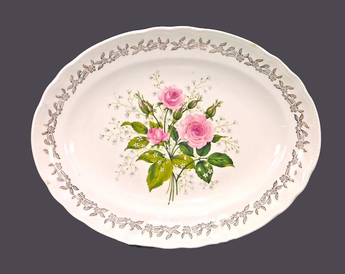 Sovereign Potters Jubilee Rose oval meat or vegetable serving platter. English ironstone decorated in Canada. Flaw (see below).