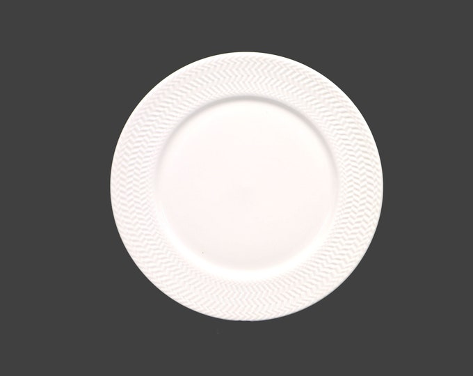 Stokes Wicker White Chef's favorite all-white large dinner plate with embossed wicker rim. Sold individually.