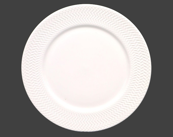 Stokes Wicker White Chef's favorite all-white large dinner plate with embossed wicker rim. Sold individually.