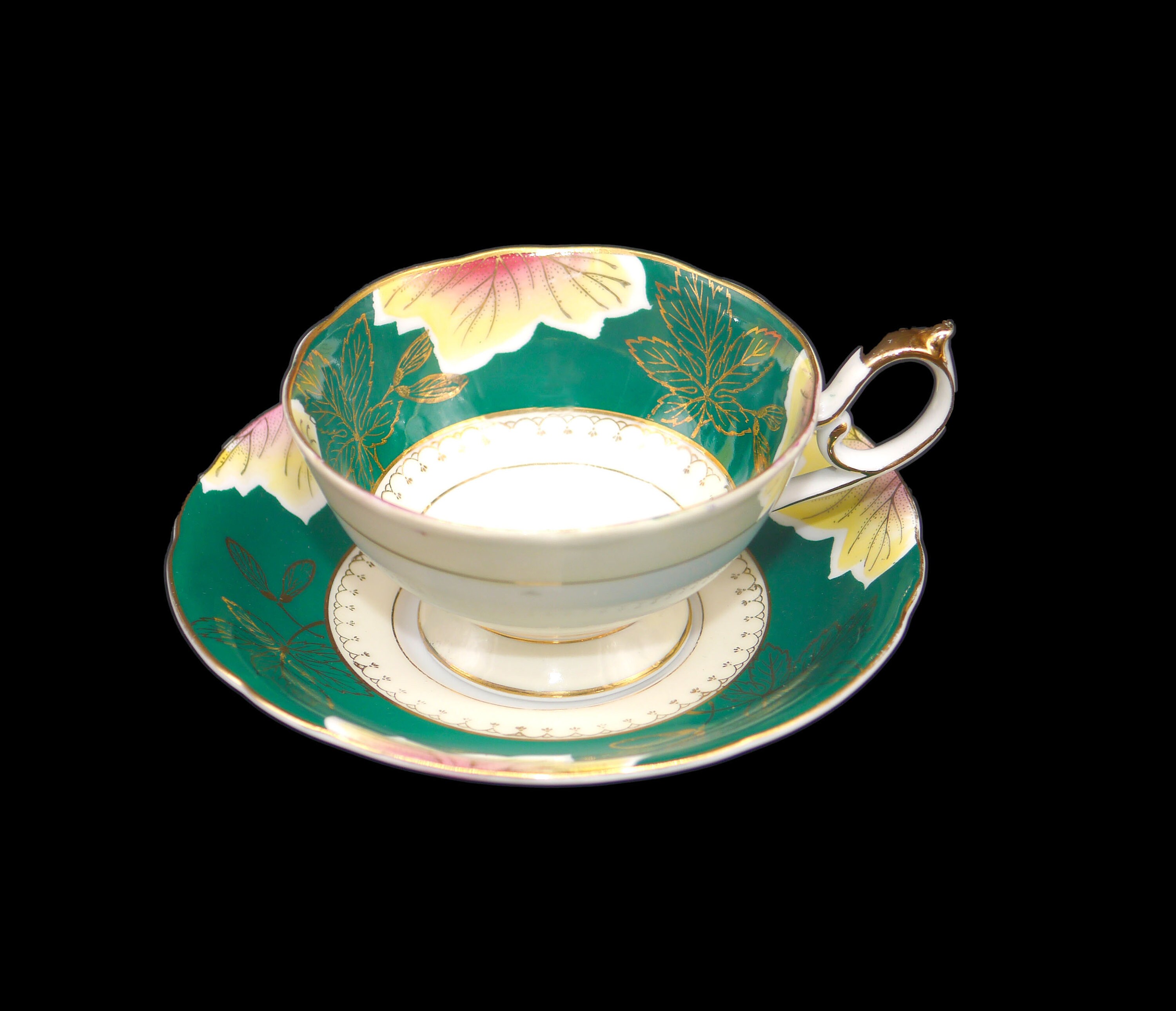 Shafford handdecorated tea set. Green medallion center gold leaves