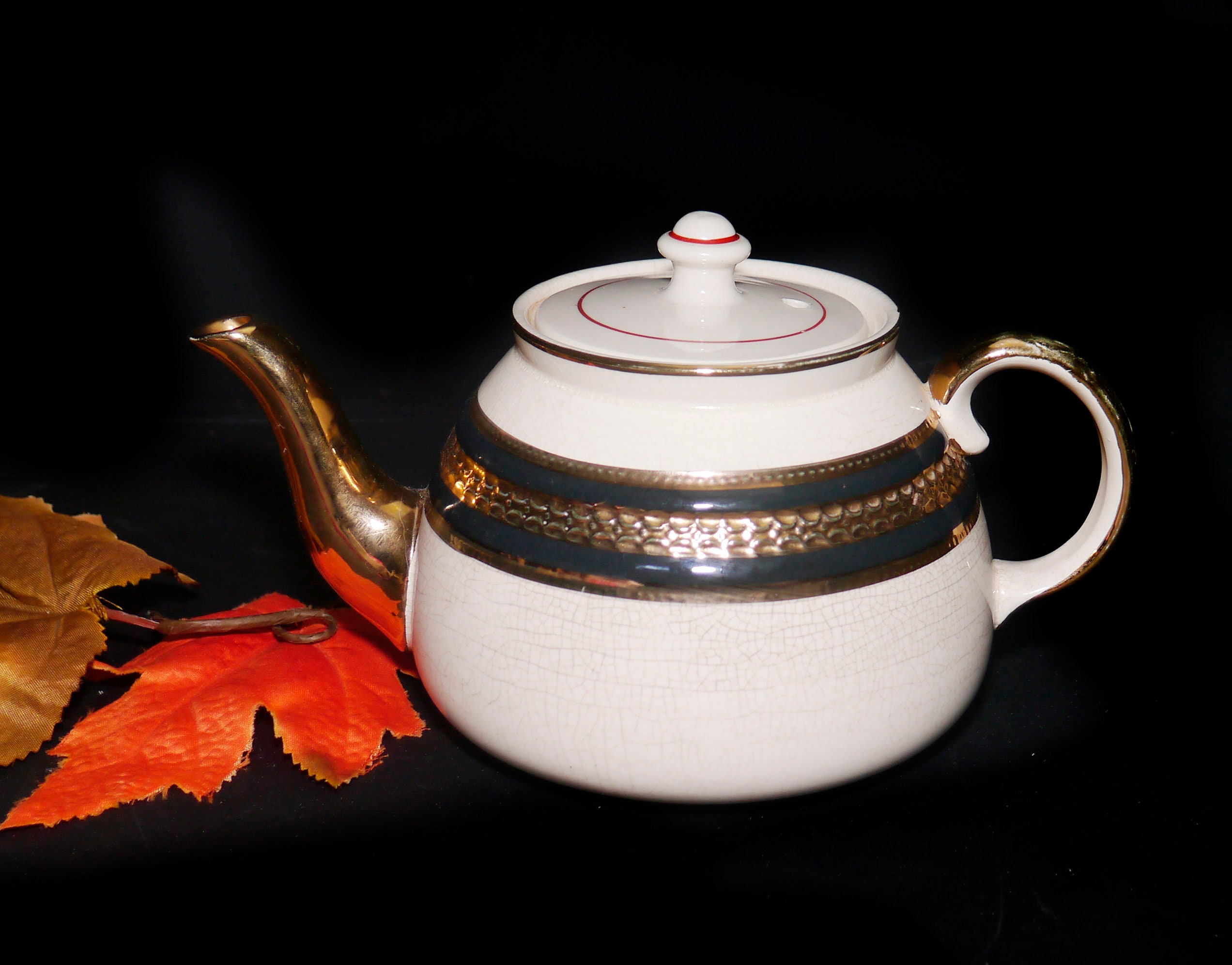 Gibsons England W714 teapot with lid. Embossed gold and cobalt bands.