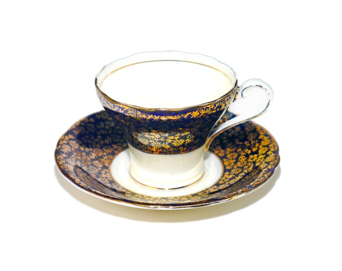 John Aynsley C563 bone china cobalt and filigree tea set made in England. Flaws (see below).