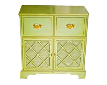 MCM General Electric Combination 326 phonograph and radio featuring beam-a-scope. Shortwave and broadcast. Green Canada Cabinets console.