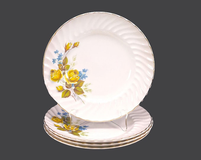 Four Ridgway Favourite Rose dinner plates made in England.