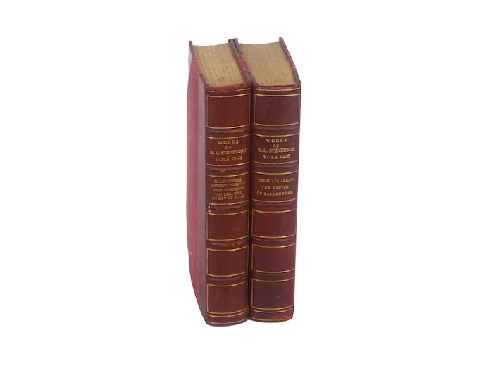 Pair of antiquarian books. Robert Louis Stevenson Black Arrow, Master of Ballantrae, The Ebb-Tide and more. Heinemann London Tusitalia.