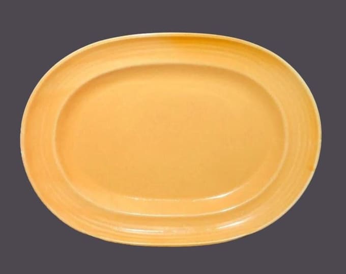 Pier 1 Festival Marigold all-yellow oval platter made in Japan.