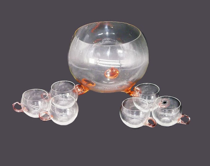 Hand-blown pink glass punch bowl set. Super cute pink shell feet on punch bowl, 6 glass cups. Attributed Sussmuth.