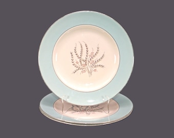 Three Homer Laughlin Triumph dinner plates. Cavalier Eggshell made in USA.