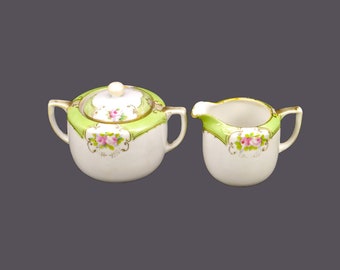 Antique art-nouveau hand-painted Nippon | Noritake Maruki creamer and covered sugar bowl. Pink roses, green bands, moriage. Flaws.
