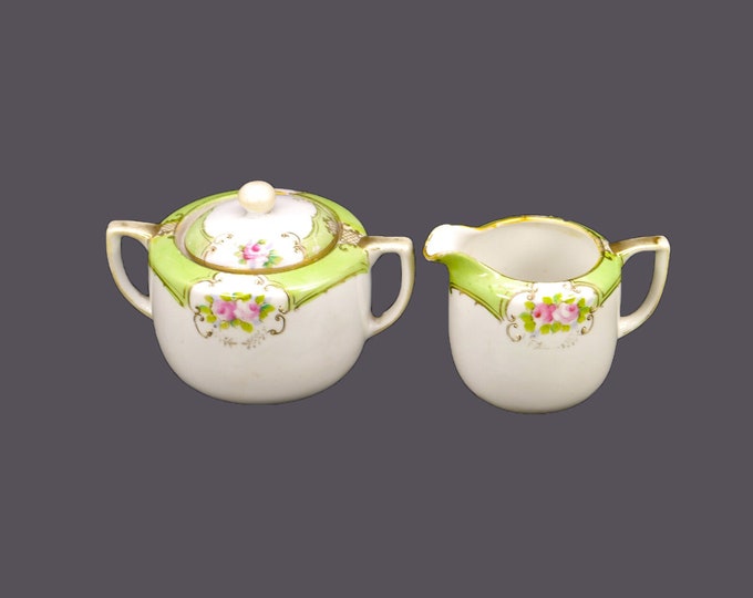 Antique hand-painted Nippon | Noritake Maruki creamer and covered sugar bowl. Pink roses, green bands, moriage. Flaws.