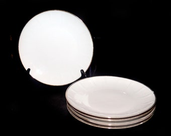 Five Winterling Roslau white gold dinner plates made in Bavaria. Embossed lines, complements WIG293. Flaw.