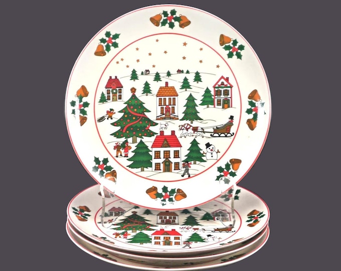 Four Christmas Pleasure style JAP97 salad plates made by Fine China of Japan.