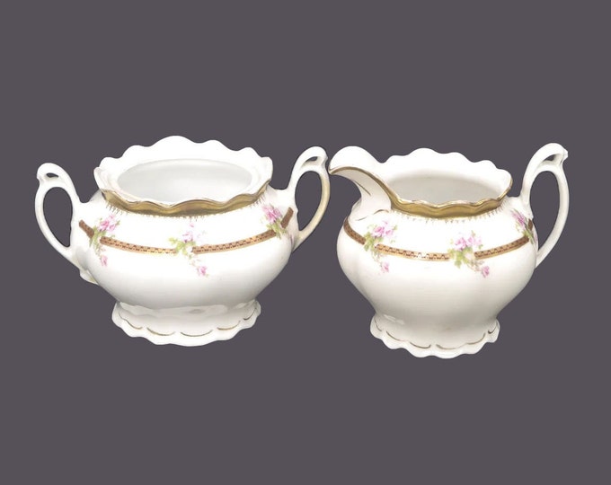 MZ Austria Altrohlau creamer and sugar bowl. Bridal roses, maroon and gold zipper band. Similar to Altrohlau 8480. Flaws (see below).