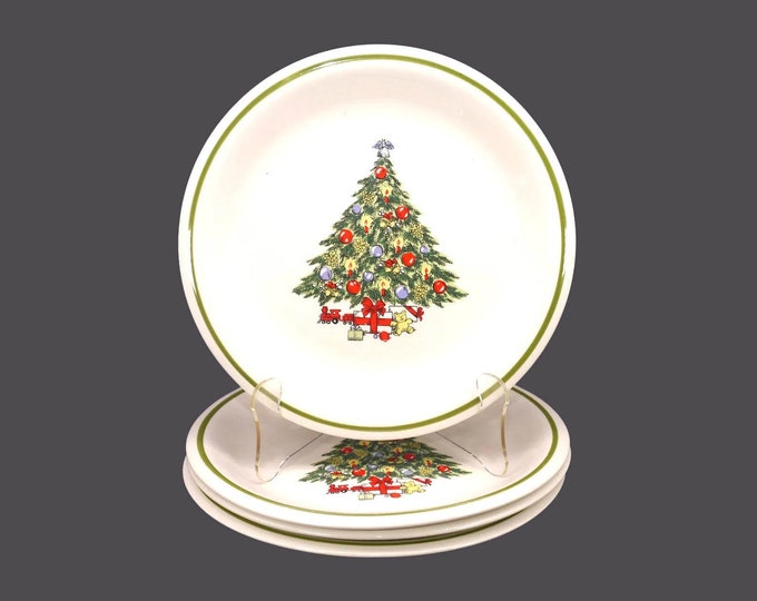 Four CX87 Christmas stoneware dinner plates.