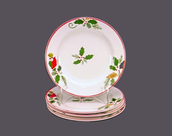 Four Pfaltzgraff Cardinal & Holly Christmas salad plates.