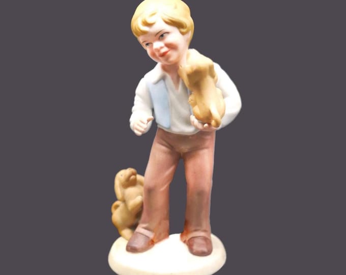 Avon Best Friends porcelain bisque figurine. Young boy with two dogs.