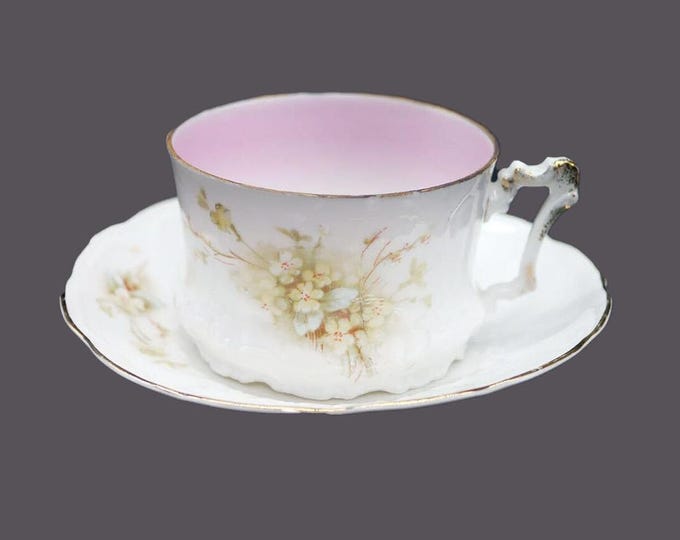 Antique Weimar Bavaria hand-painted cup and saucer set. Pastel florals, pink inner rim. Flaws (see below).