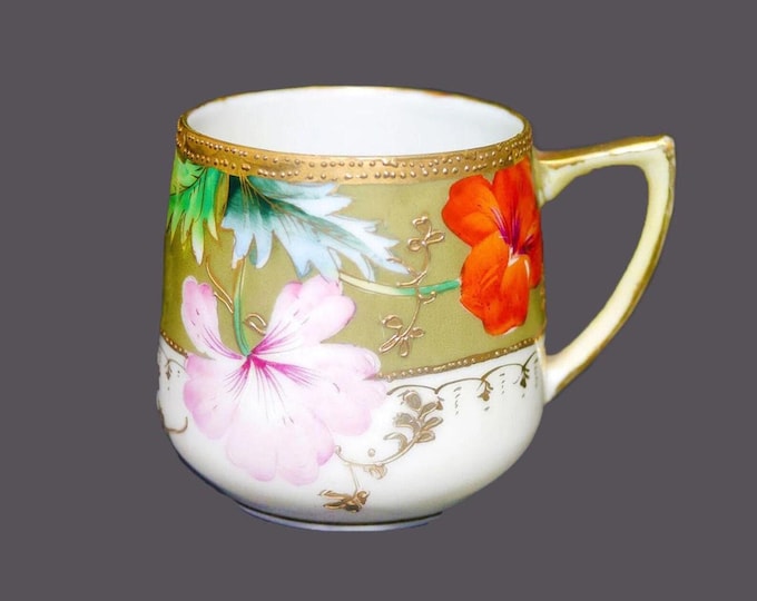 Hand-painted Nippon moriage demitasse orphaned cup only. Embossed gold, orange and pink florals.