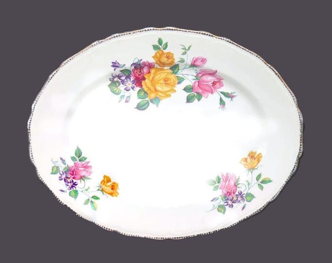 Vintage Ridgway Chateau Rose oval platter made in England. Minor flaw.