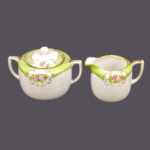 Antique hand-painted Nippon | Noritake Maruki creamer and covered sugar bowl. Pink roses, green bands, moriage. Flaws.