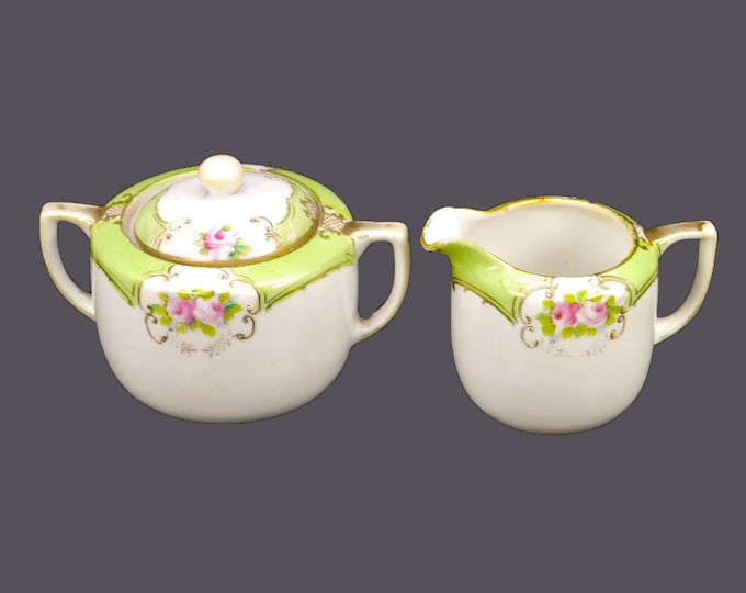 Antique hand-painted Nippon | Noritake Maruki creamer and covered sugar bowl. Pink roses, green bands, moriage. Flaws.