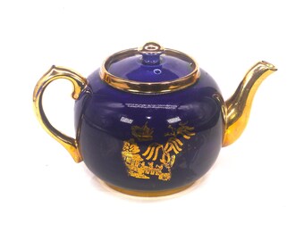Vintage Sudlows C1900 cobalt & gold Chinoiserie teapot. Pagoda theme. Flaw.