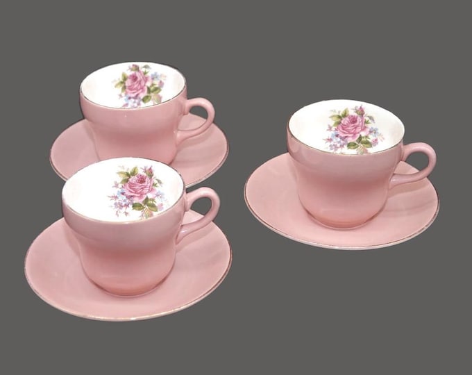Three antique Edwardian Age Royal Art Pottery tea sets. Pink with roses, blue florals, greenery gold trim.