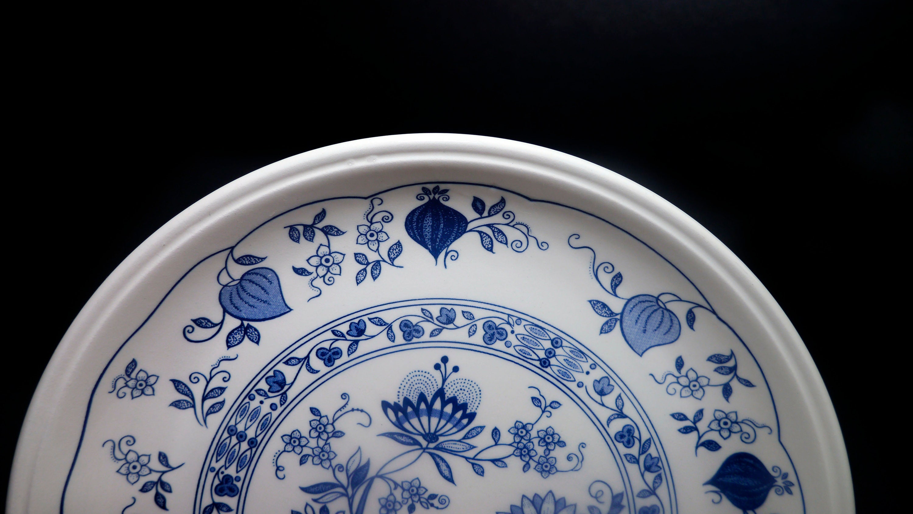 Four Biltons Blue Onion dinner plates made in England.