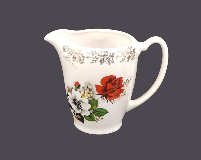 Lord Nelson Pottery milk, water, iced-tea, lemonade, kool-aid pitcher. Roses and filigree. Made in England.