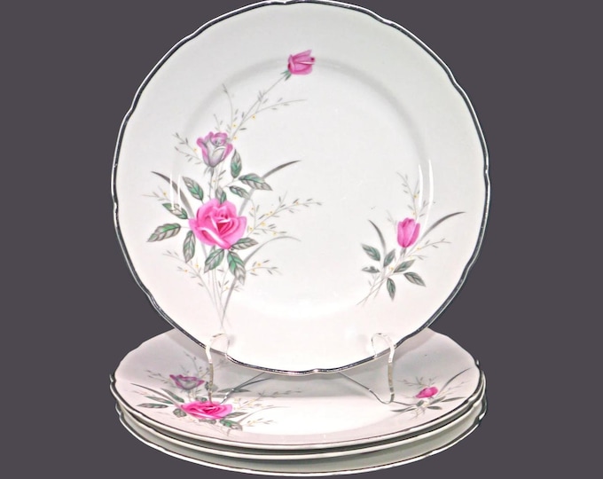 Four Fine China of Japan Breath O' Spring dinner plates.