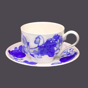 Portmeirion Harvest Blue over-sized breakfast cup and saucer set. Angharad Menna design. Blue-and-white tableware made in England.