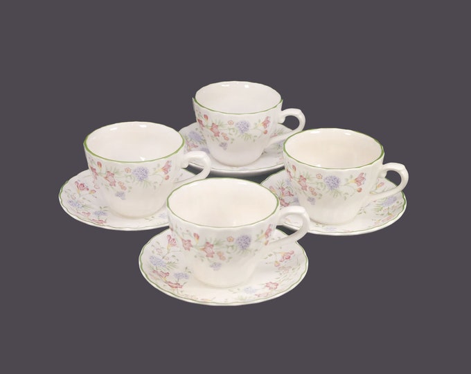 Four Churchill China Emily cup and saucer sets made in England. Multicolor florals.