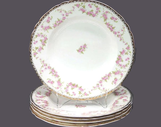 Five Alfred Meakin Harmony Rose rimmed soup bowls made in England.