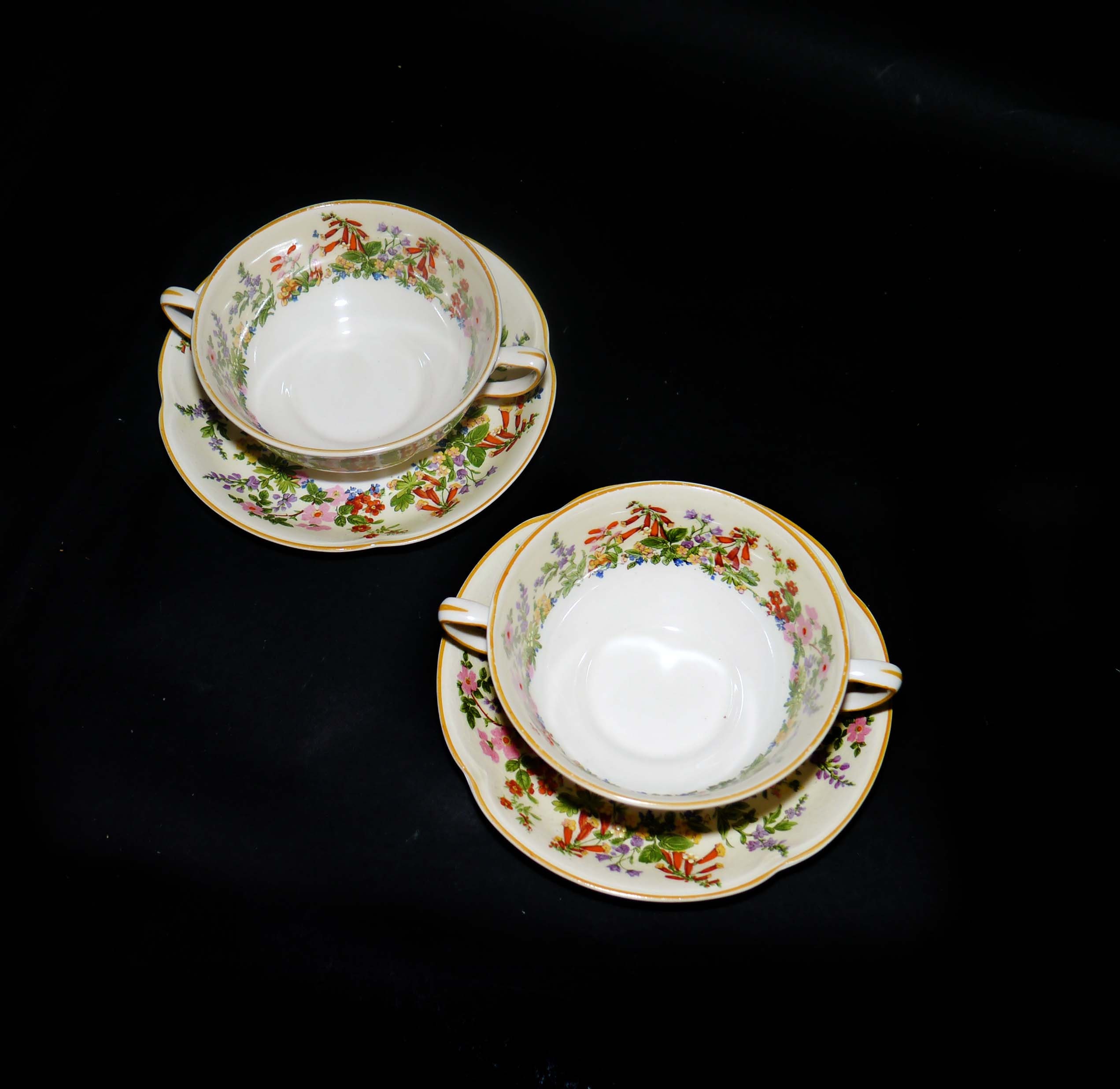 Pair of antique Johnson Brothers Sweet Briar cream soup bouillon sets