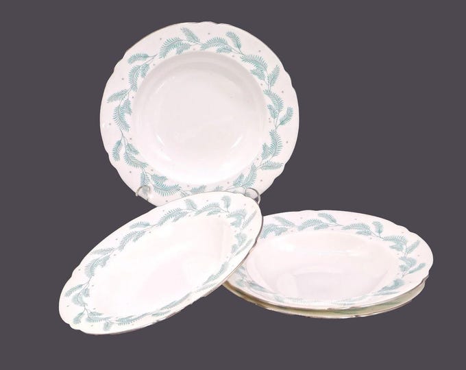 Four Shelley Serenity rimmed soup bowls. Bone china made in England.