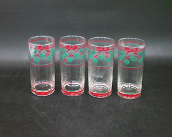 Four Anchor Hocking Christmas tumbler glasses. Etched-glass holly, red bows and berries made in USA.