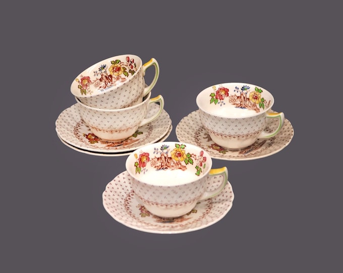 Four art-deco era Royal Doulton Grantham D5477 cup and saucer sets made in England.