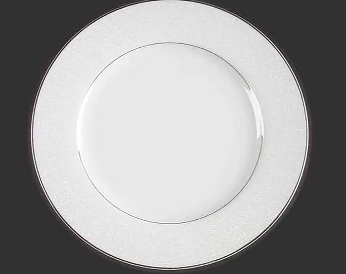 International Wakefield 364 white lace dinner plate made in Japan. Sold individually.