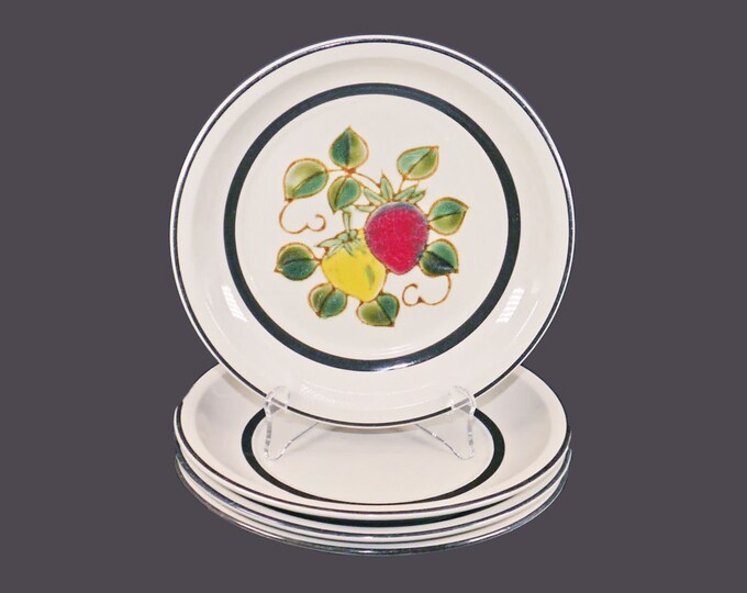 Four Sears Strawberries 4112 stoneware salad plates made in Japan. Three have pattern, one has bands only.