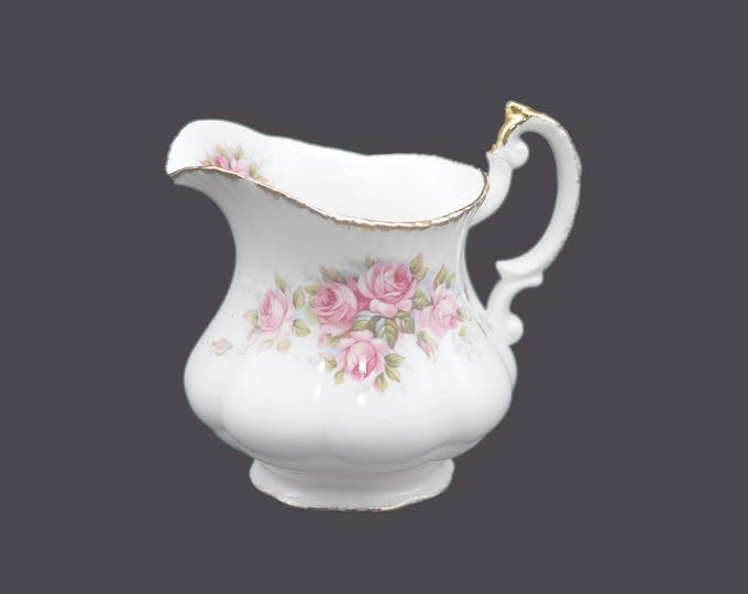 Paragon Elizabeth Rose bone china creamer jug made in England. Flaw (see below).