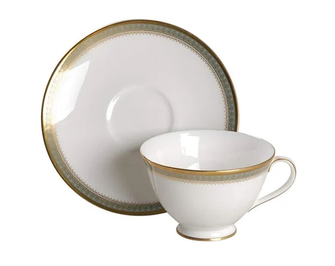 Royal Doulton Clarendon H4993 bone china cup and saucer set made in England. Sets sold individually.