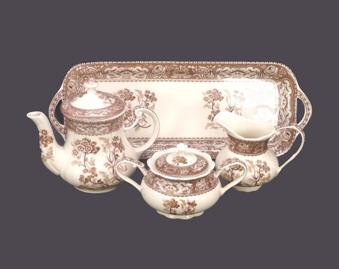 Skye McGhie Brown Botanical two-cup teapot, creamer, covered sugar bowl and matching under-tray. Hard to find.
