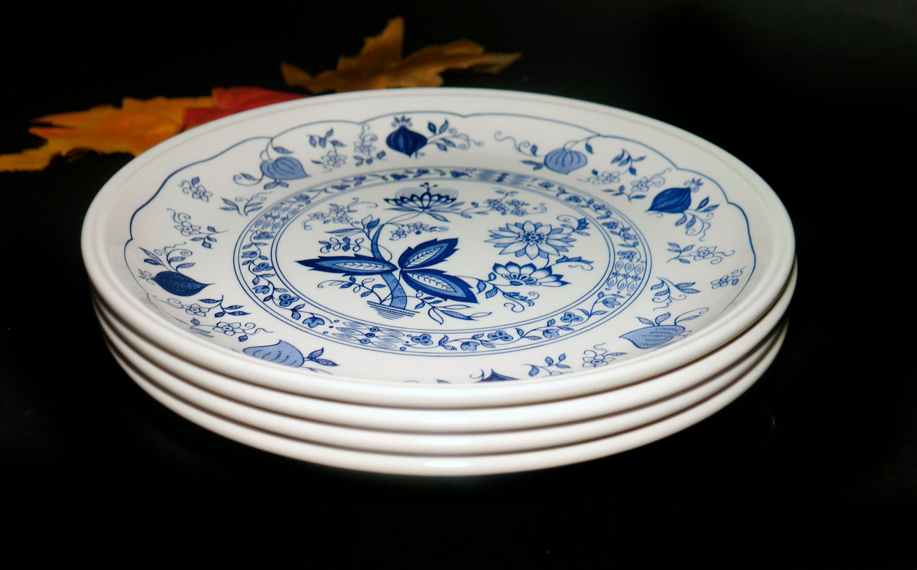 Four Biltons Blue Onion dinner plates made in England.