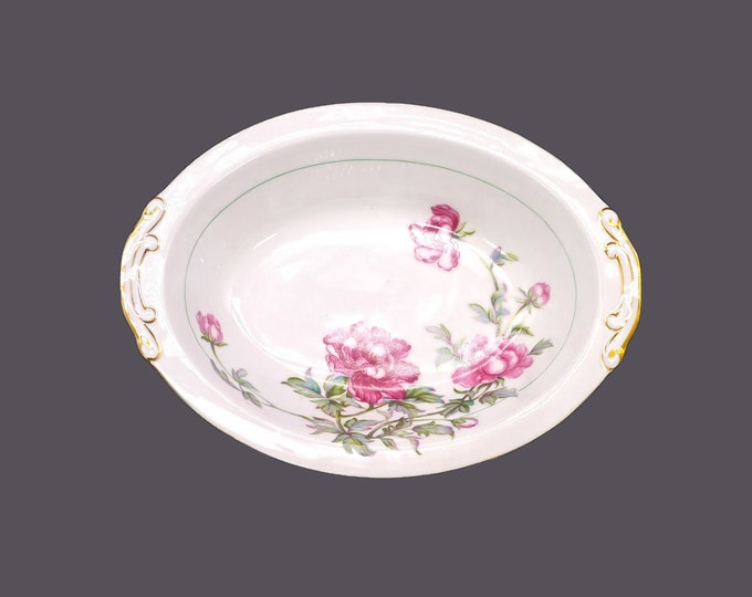 Kyoto Peony oval lugged serving bowl made in Japan. Pink peonies, embossed gold accents.